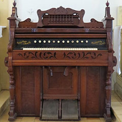 Harmonium fait en acajou, ivoire, métal et résine par Thomas Organ & Piano Co.